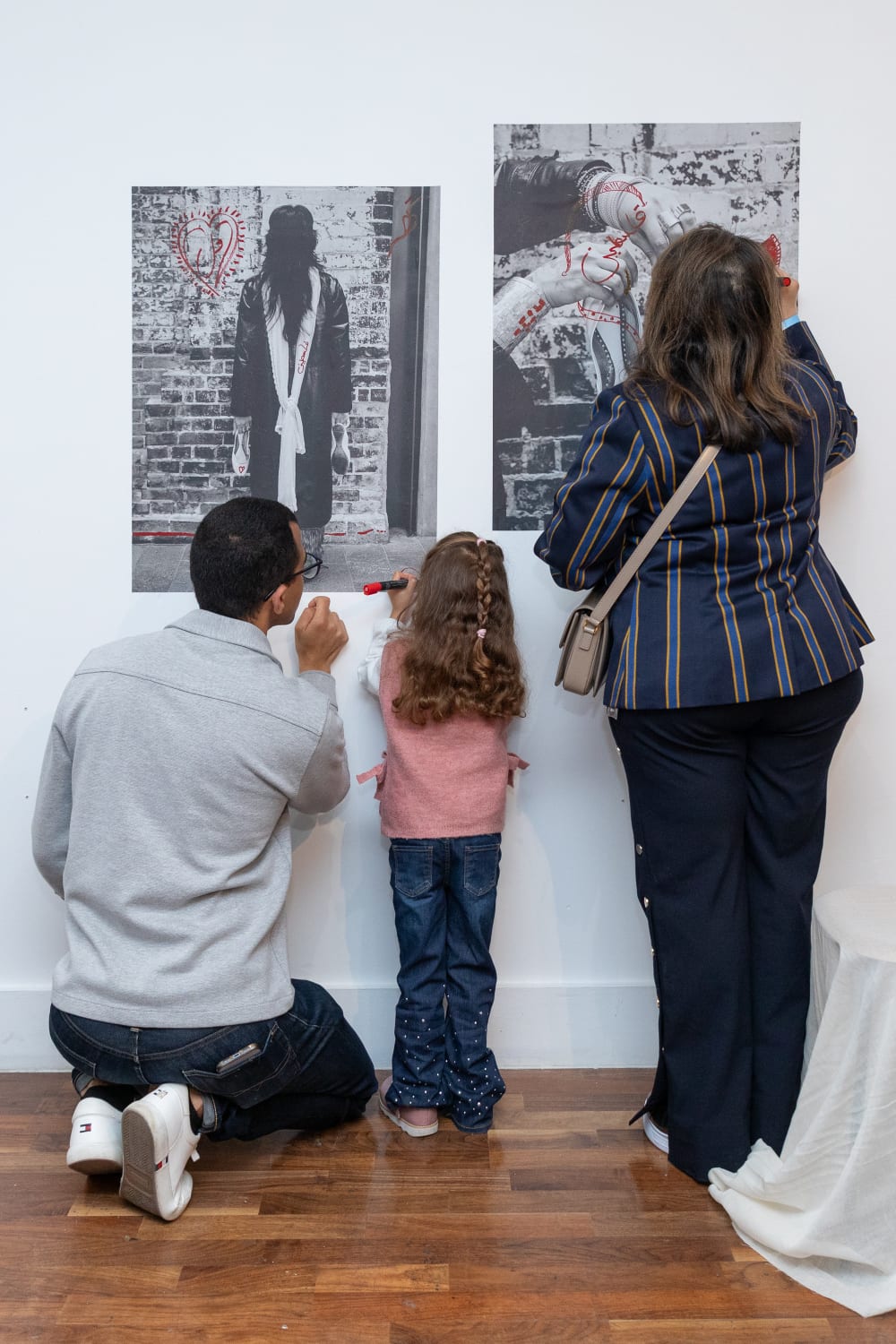 Guests drawing on black and white photos