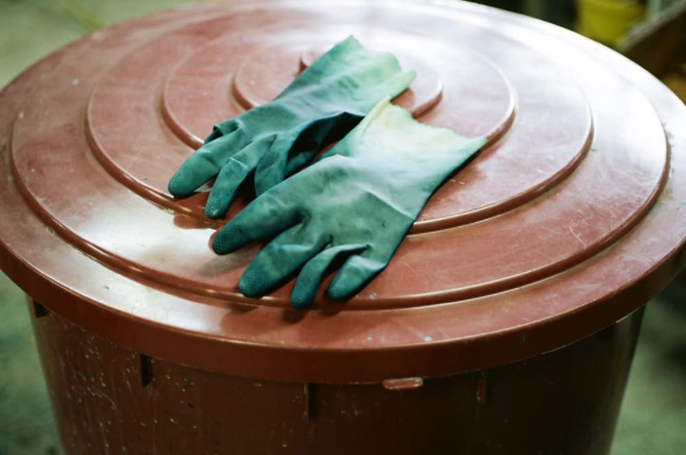 gloves laid on top of a structure