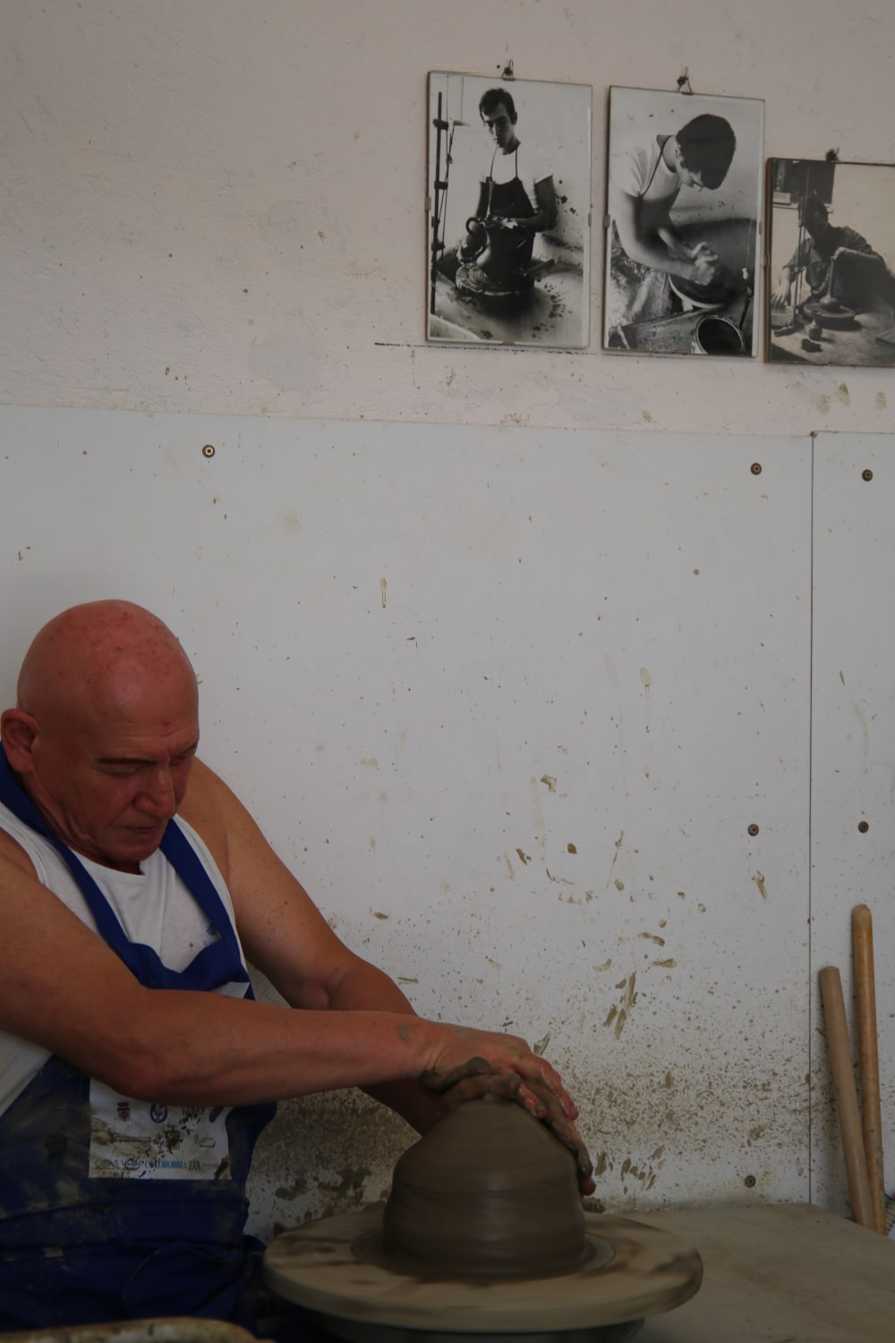 A man making a clay pot