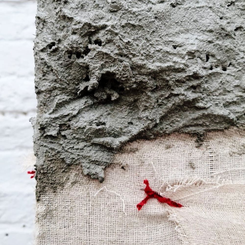 concrete and fabric sewn together