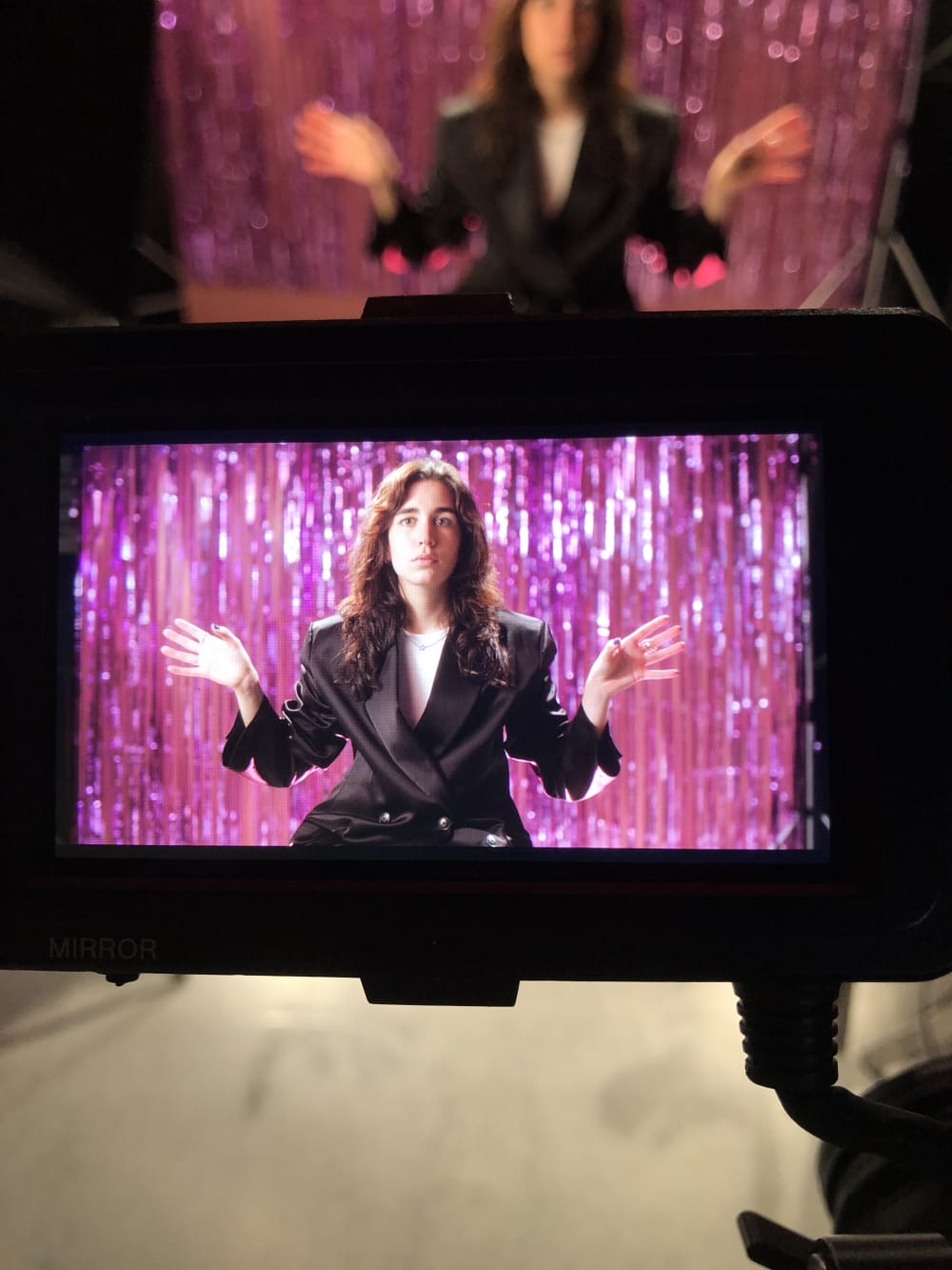 Shot of model Blanca in camera viewfinder on film set