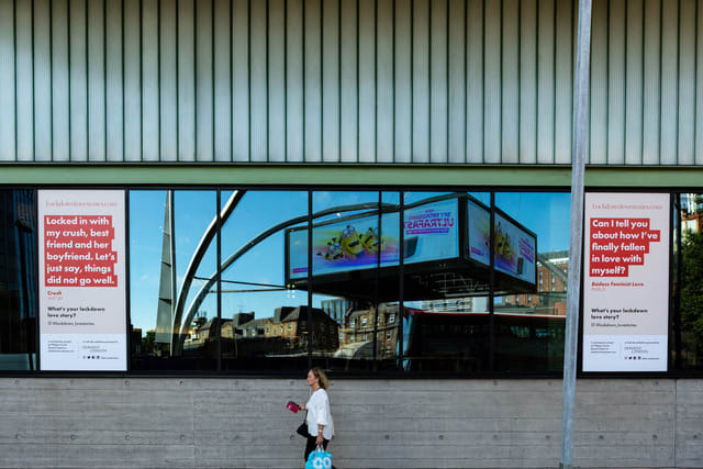 Two large vinyl posters. On the left: 