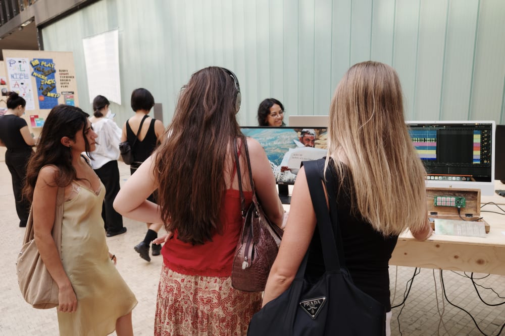 Students looking at the 2025 CSM Shows