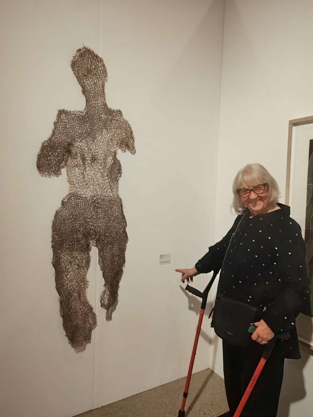 Yvonne stood with her winning artwork. 