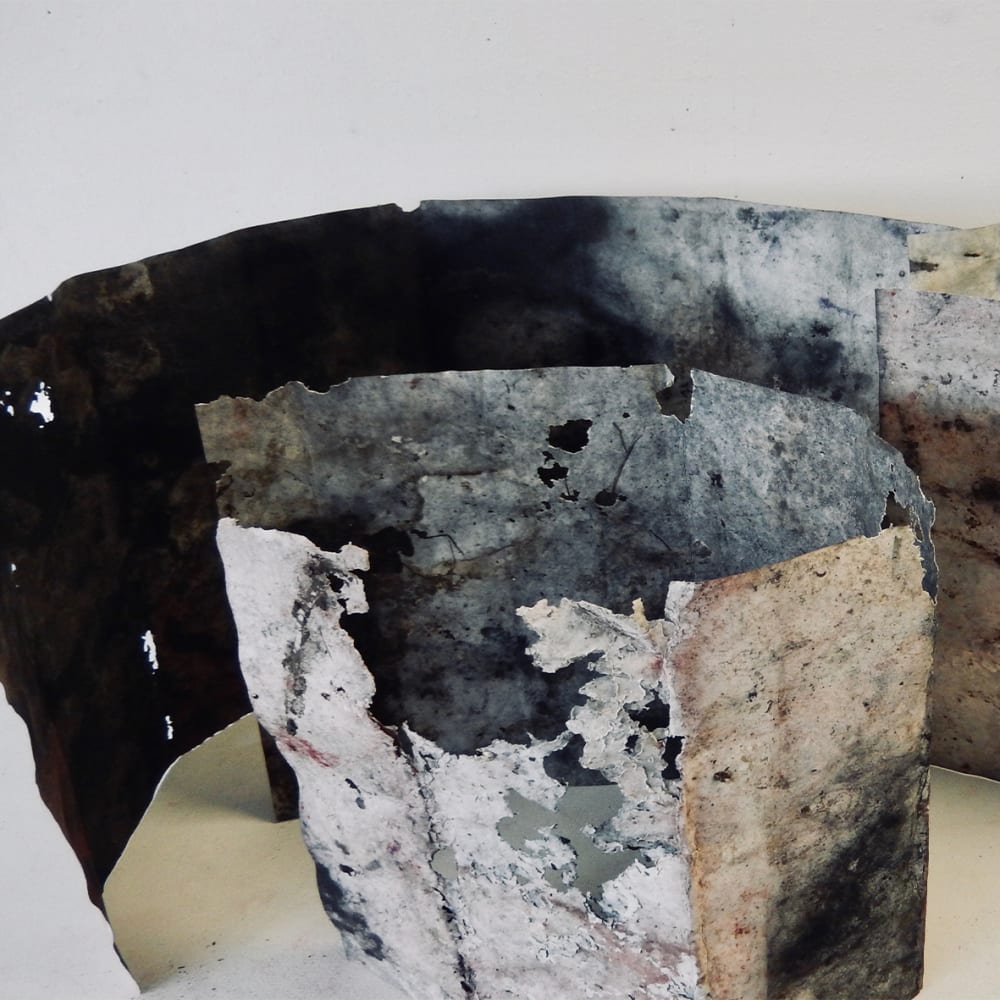 3D sculptural piece, textured, white, dark blue colours.