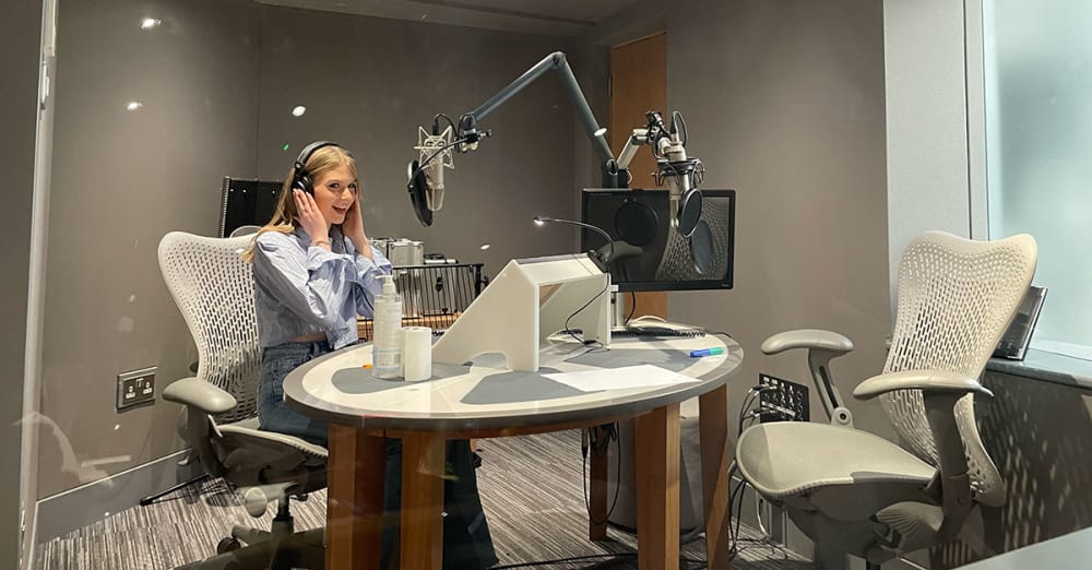 Image of a student using recording equipment.