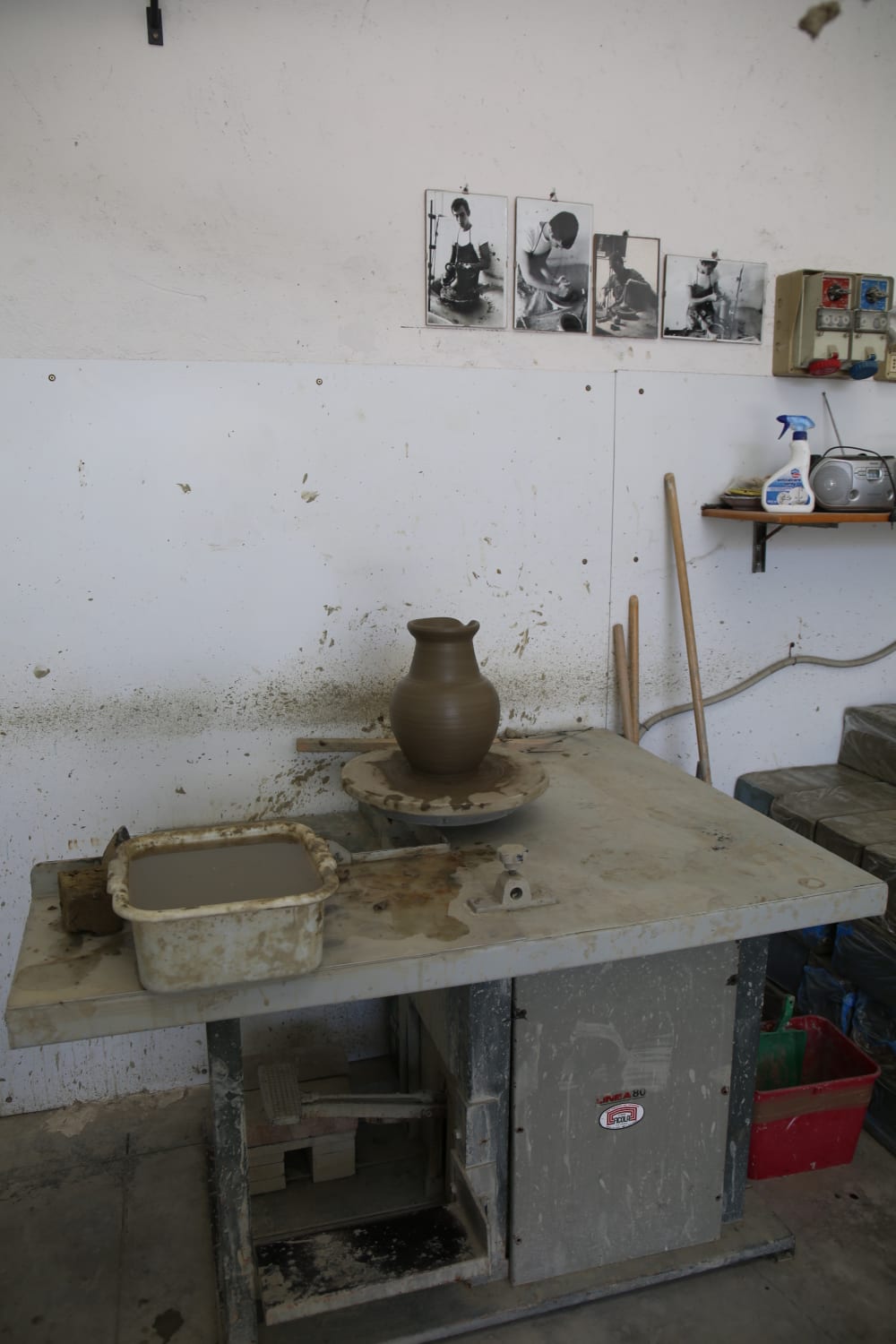 a clay pot freshly made on a table
