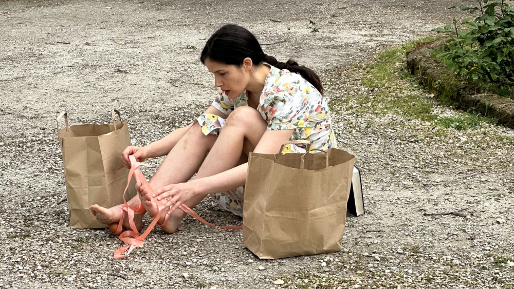 a girl sat on the ground