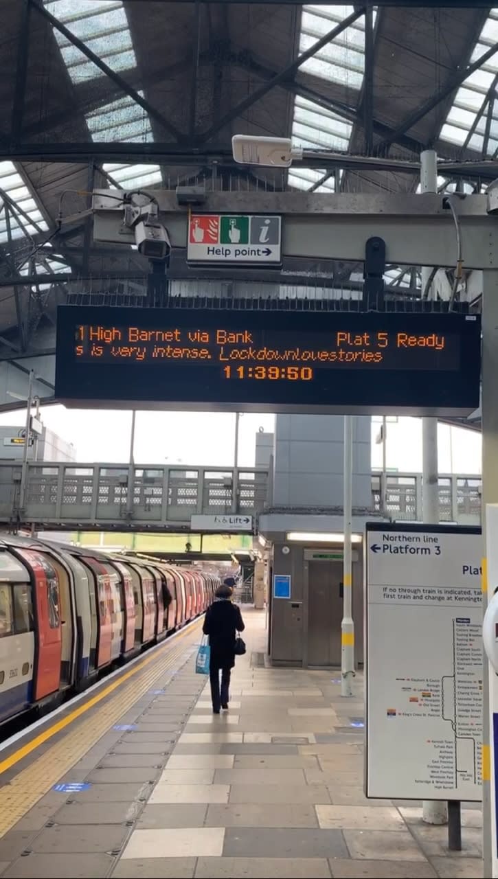 Photo of a platform board at a train station, reading: ''is very intense. LoveLockdownStories