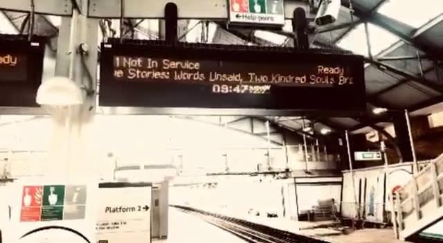 Train platform sign that says: 