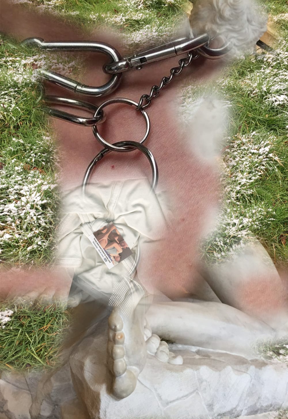 Digitally collaged photograph, featuring sections of stone statue and an explicit sexual image