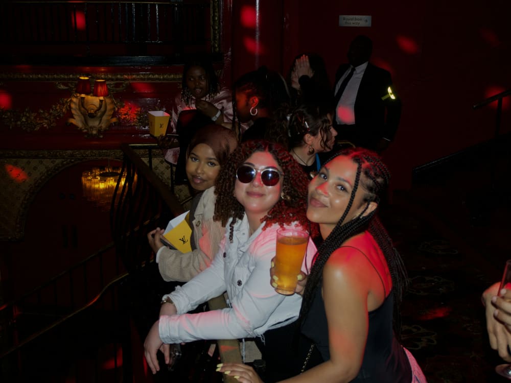 People smiling at camera. 