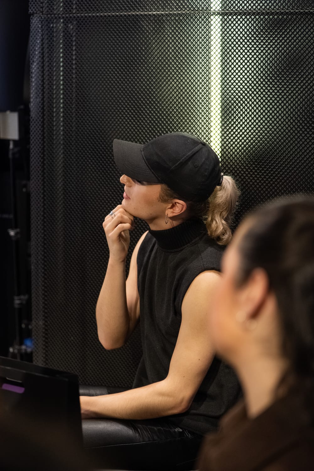 a person from the public watching attentively the demonstration