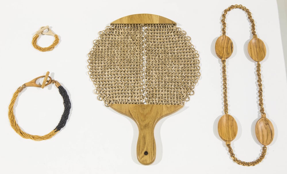 Collection of jewellery made from wooden chopping boards and spoons