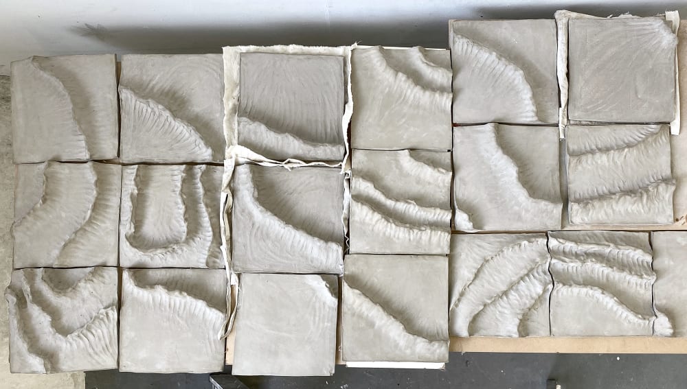 Another detail image which shows a series of the squares’ casting husks. 