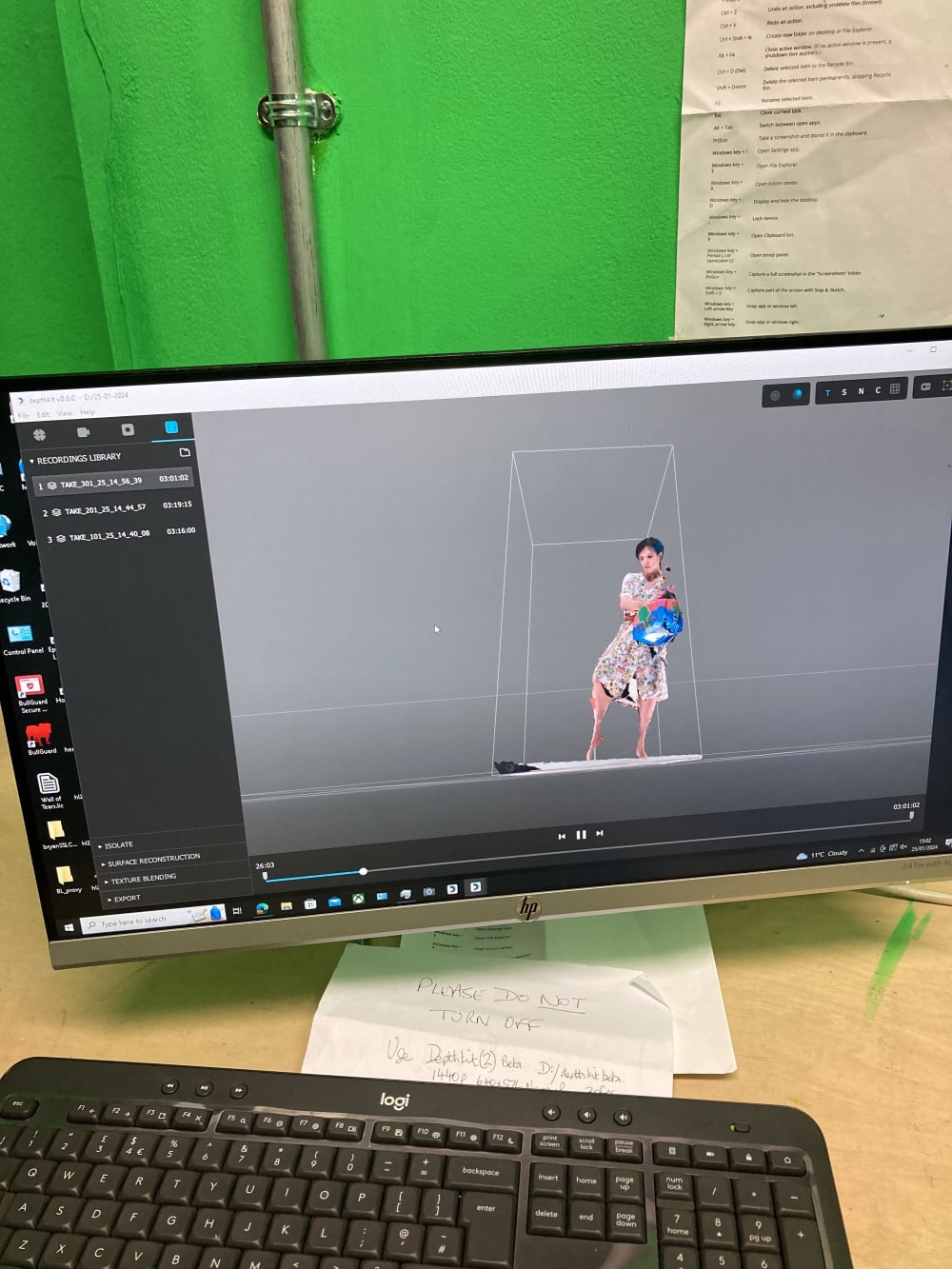 a photograph of a computer screen with images of a girl being transformed into augemneted reality