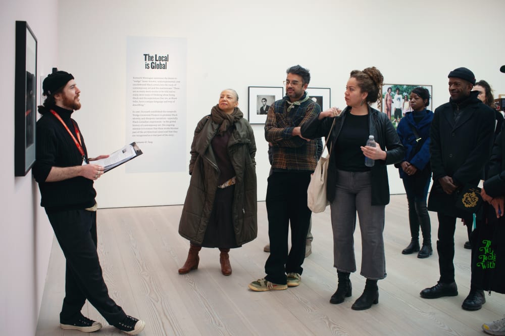 Karl standing in front of the tour group speaking