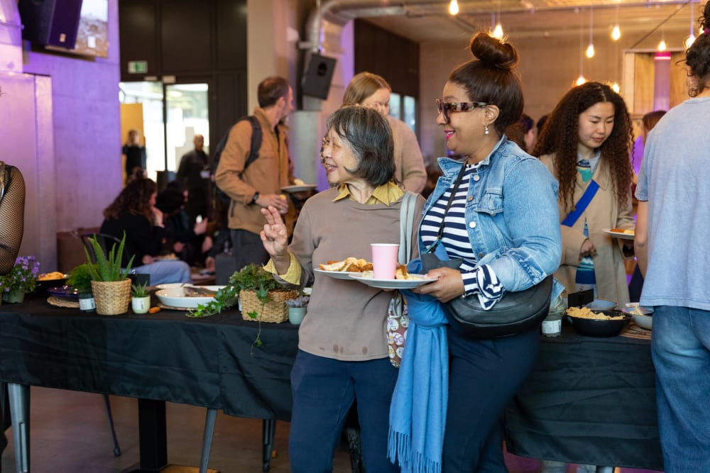 Guests standing in front of the buffet