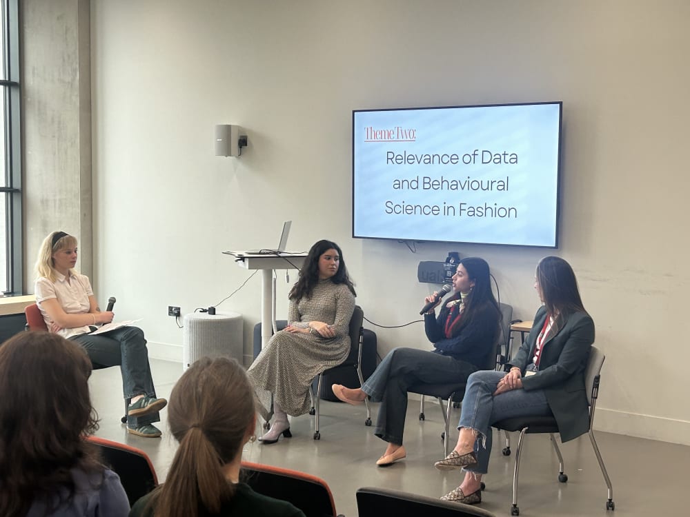 Three female panelists speaking during MSc Psychology of Fashion panel