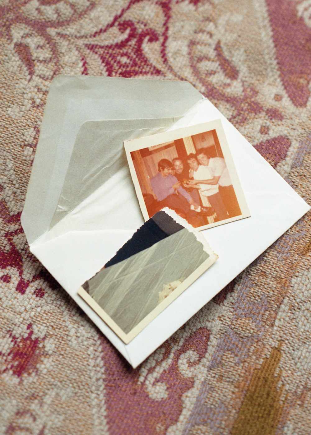 Family photos in a white envelope