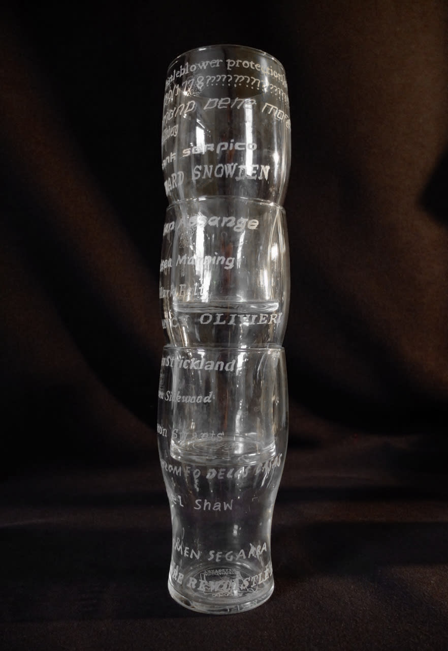 A stack of engraved glasses