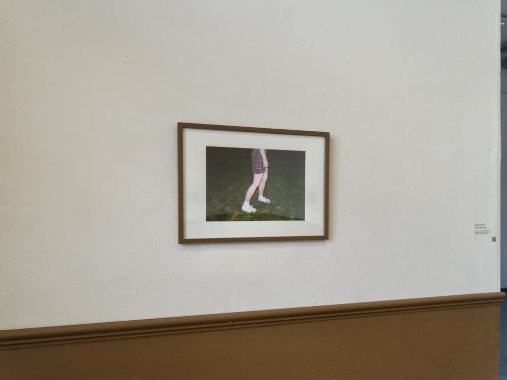 Picture of a girl's legs walking on the grass