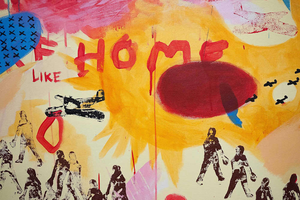 Colourful artwork combining paint, collage and text