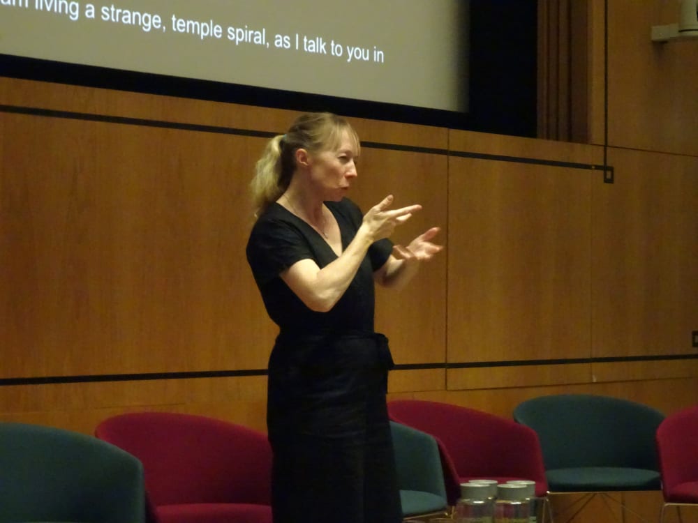 Woman using sign language during the event 