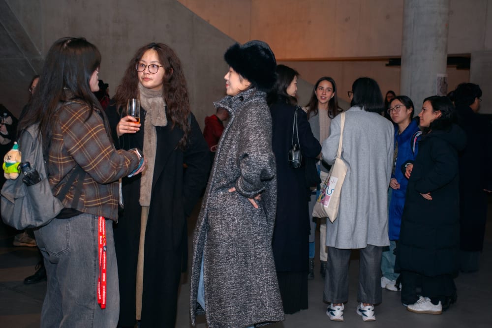 guests standing in groups and chatting
