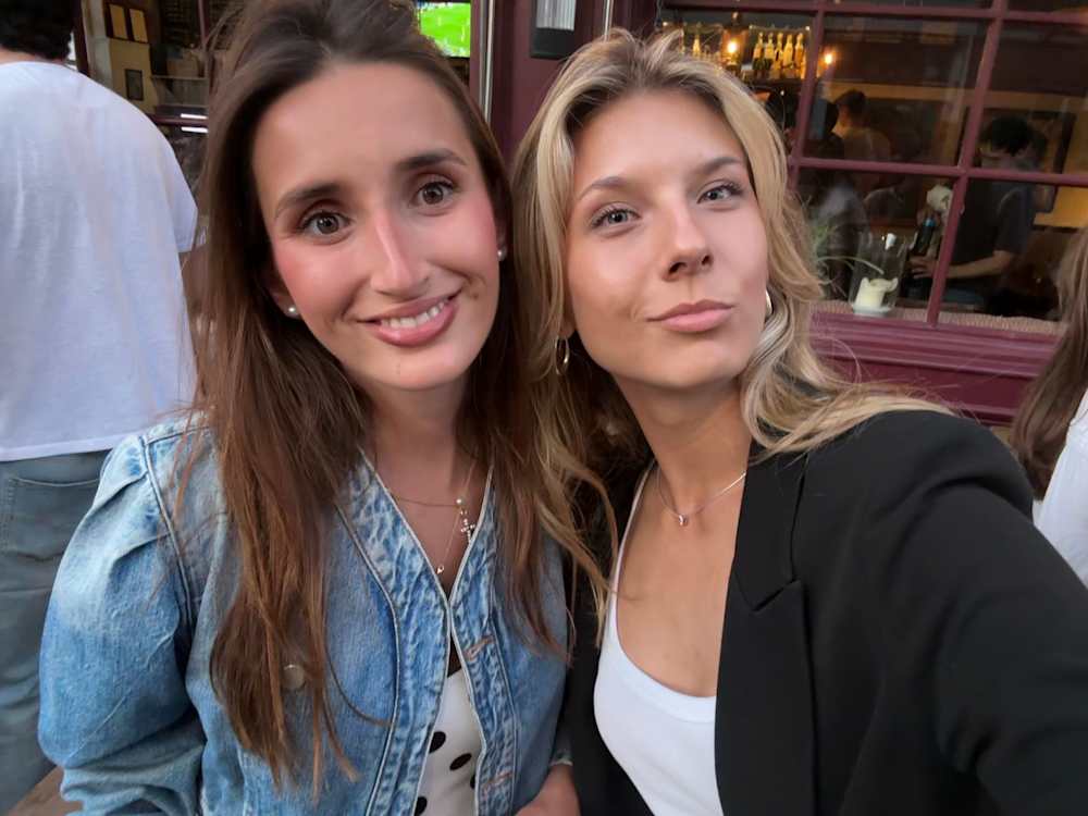 Violeta and a friend smiling