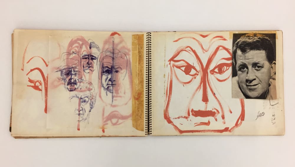 Scrapbook pages with photographs and illustrations of human faces