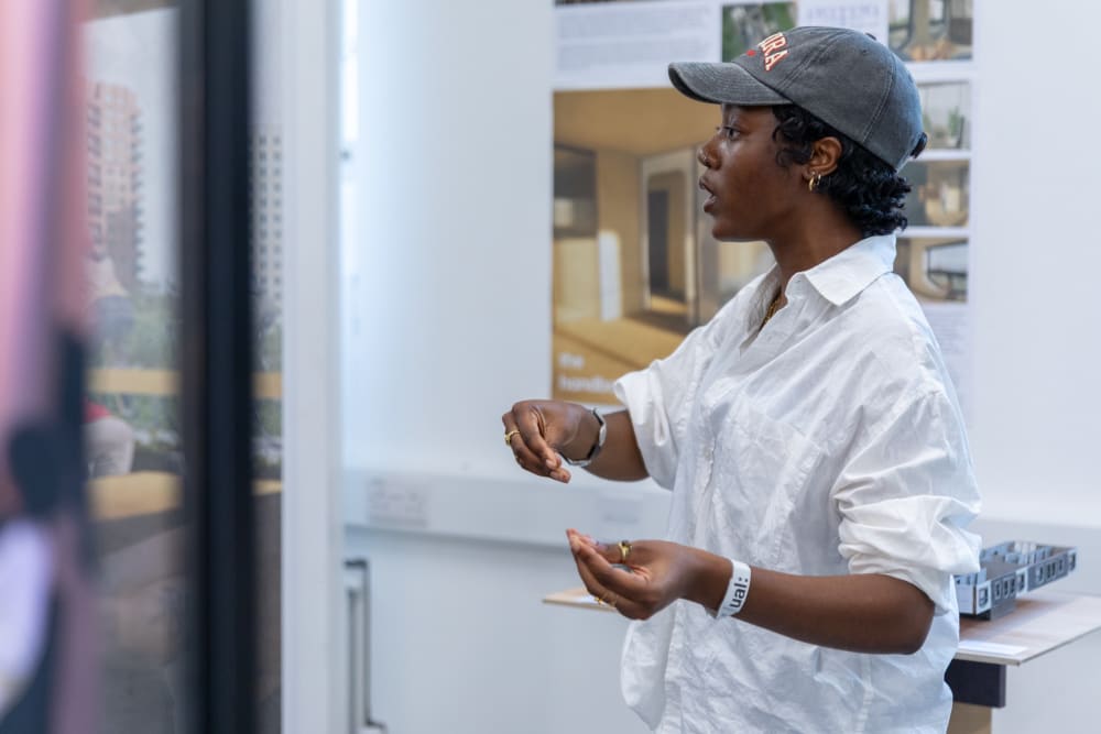 UAL student explaining their work