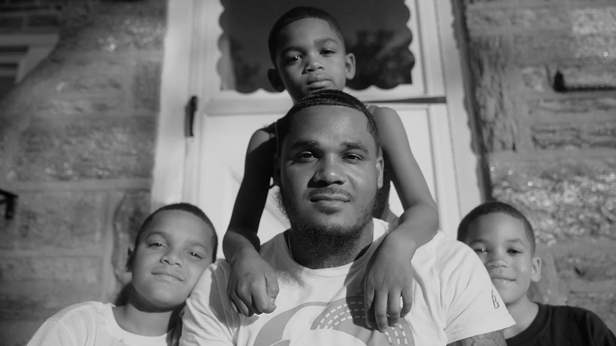 A family look at the camera.