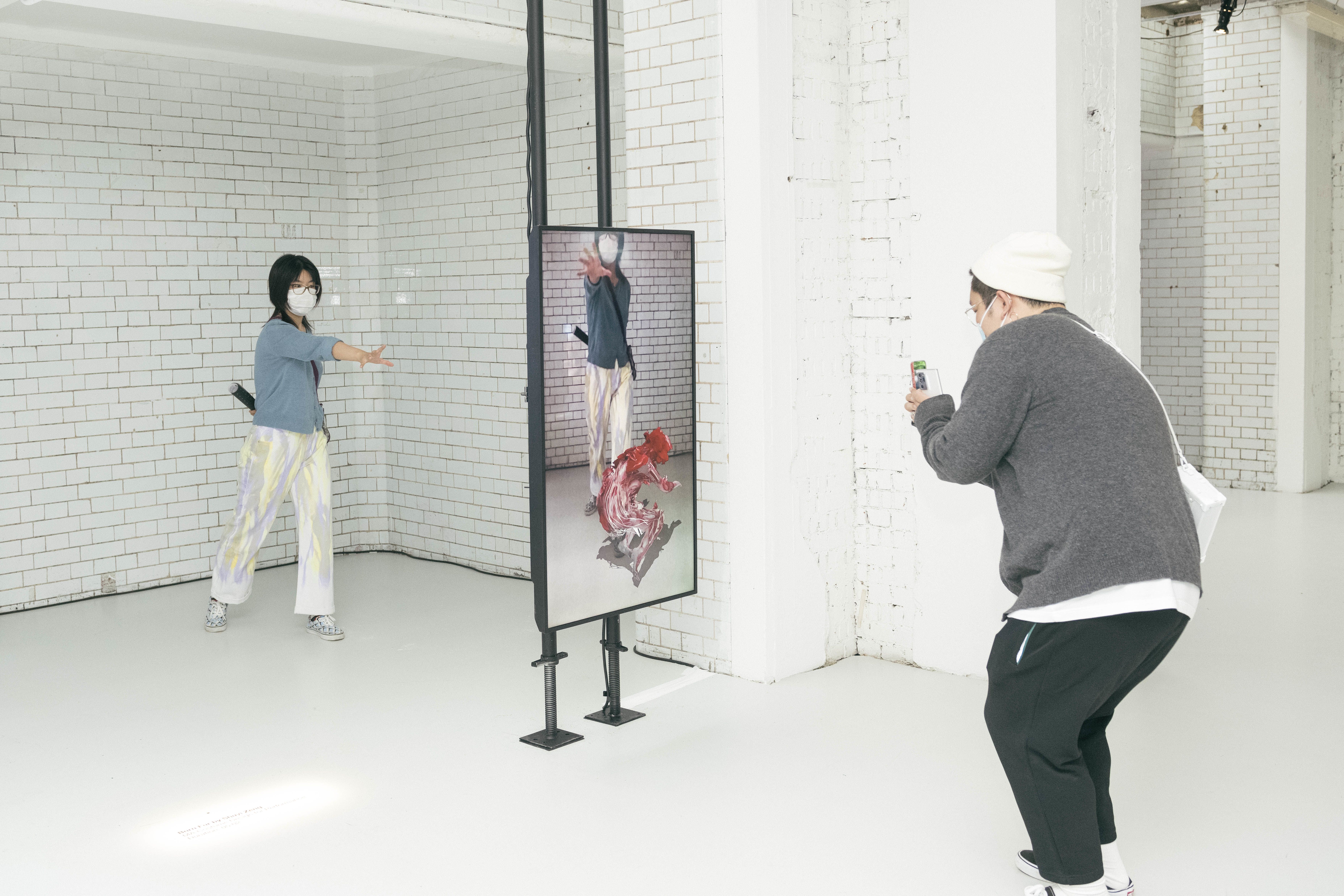 People taking photos of virtual reality 