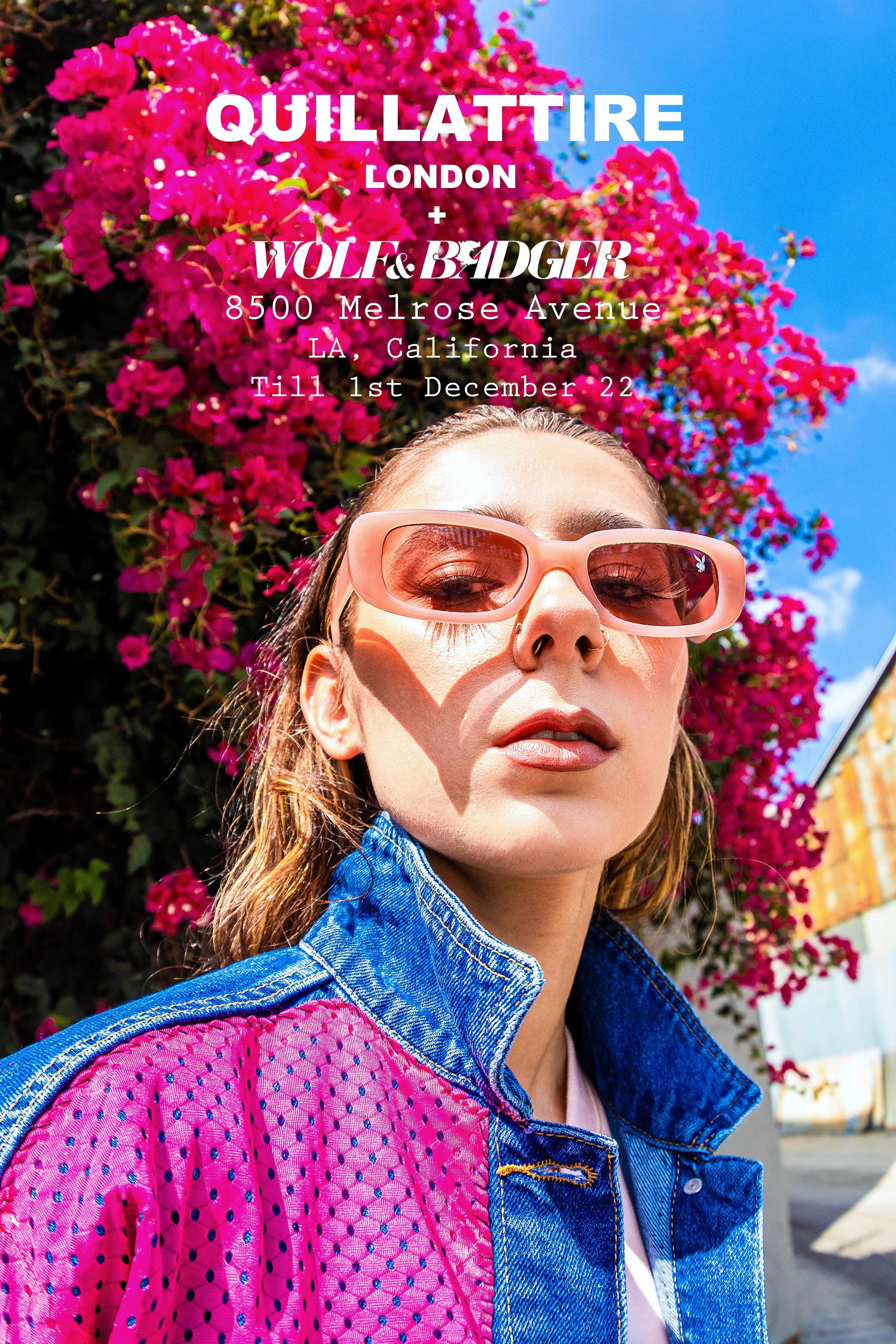 Model wearing glasses with flowers behind