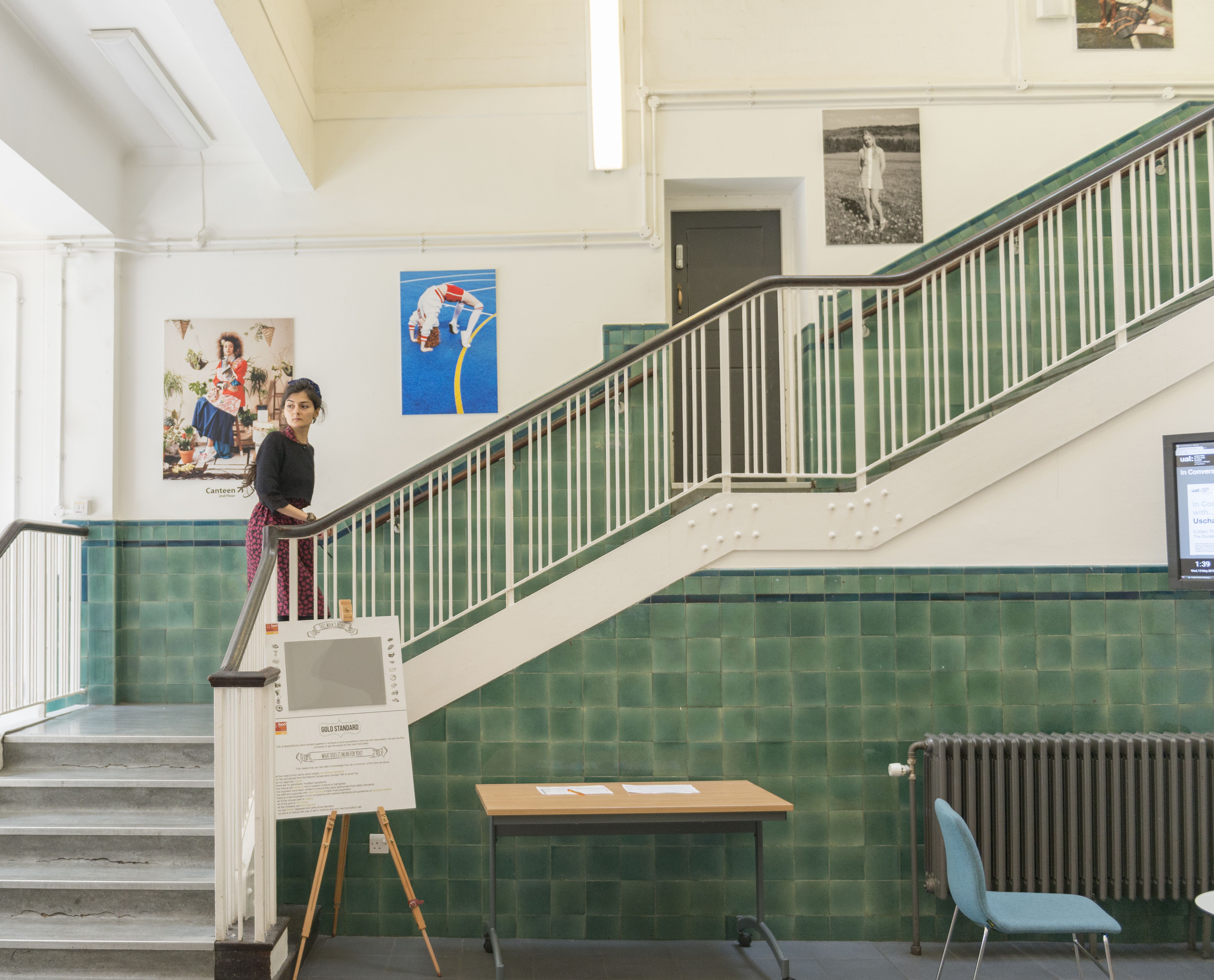 Person walking up a staircase