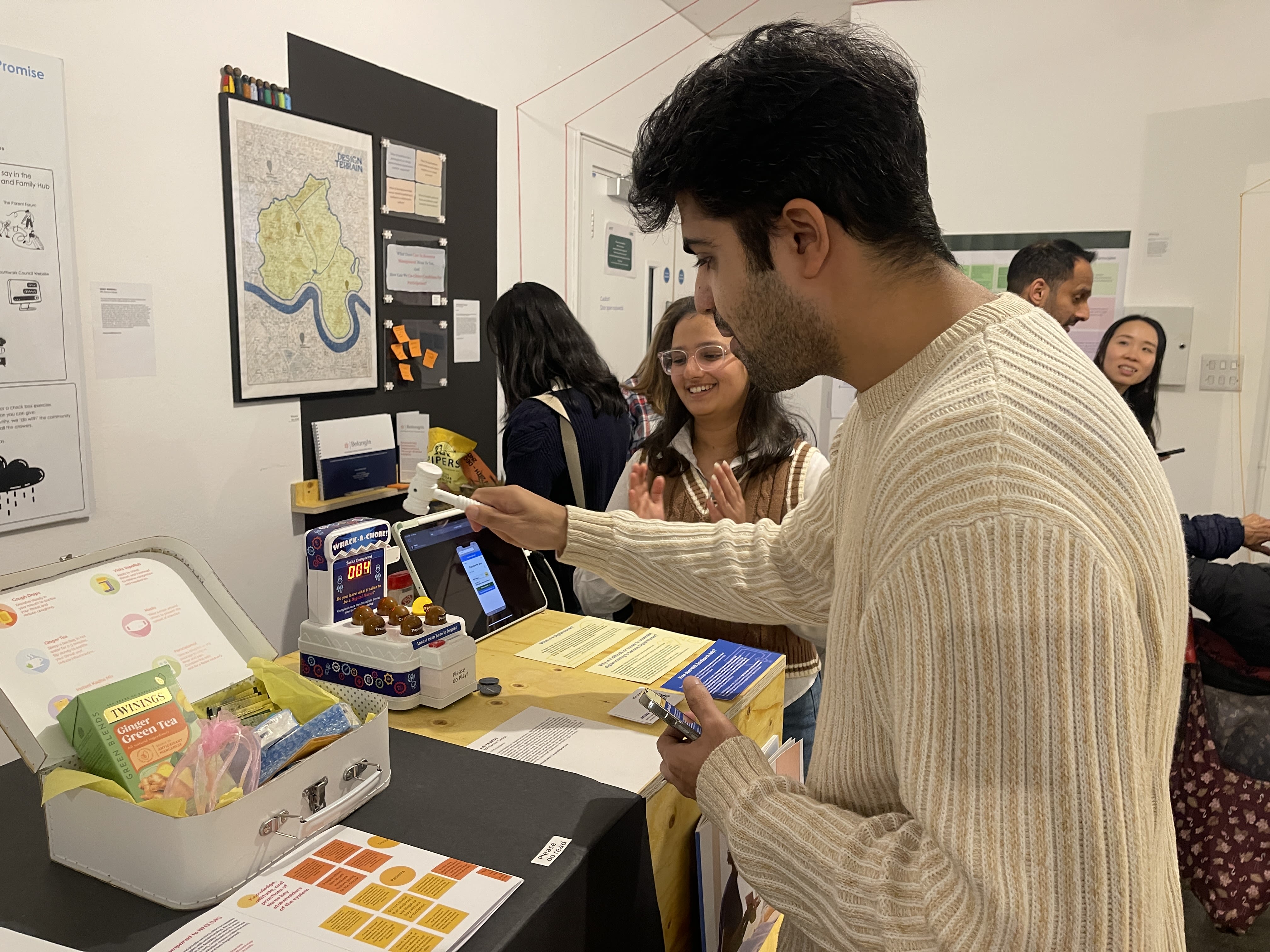 participants at an exhibition investigating the display