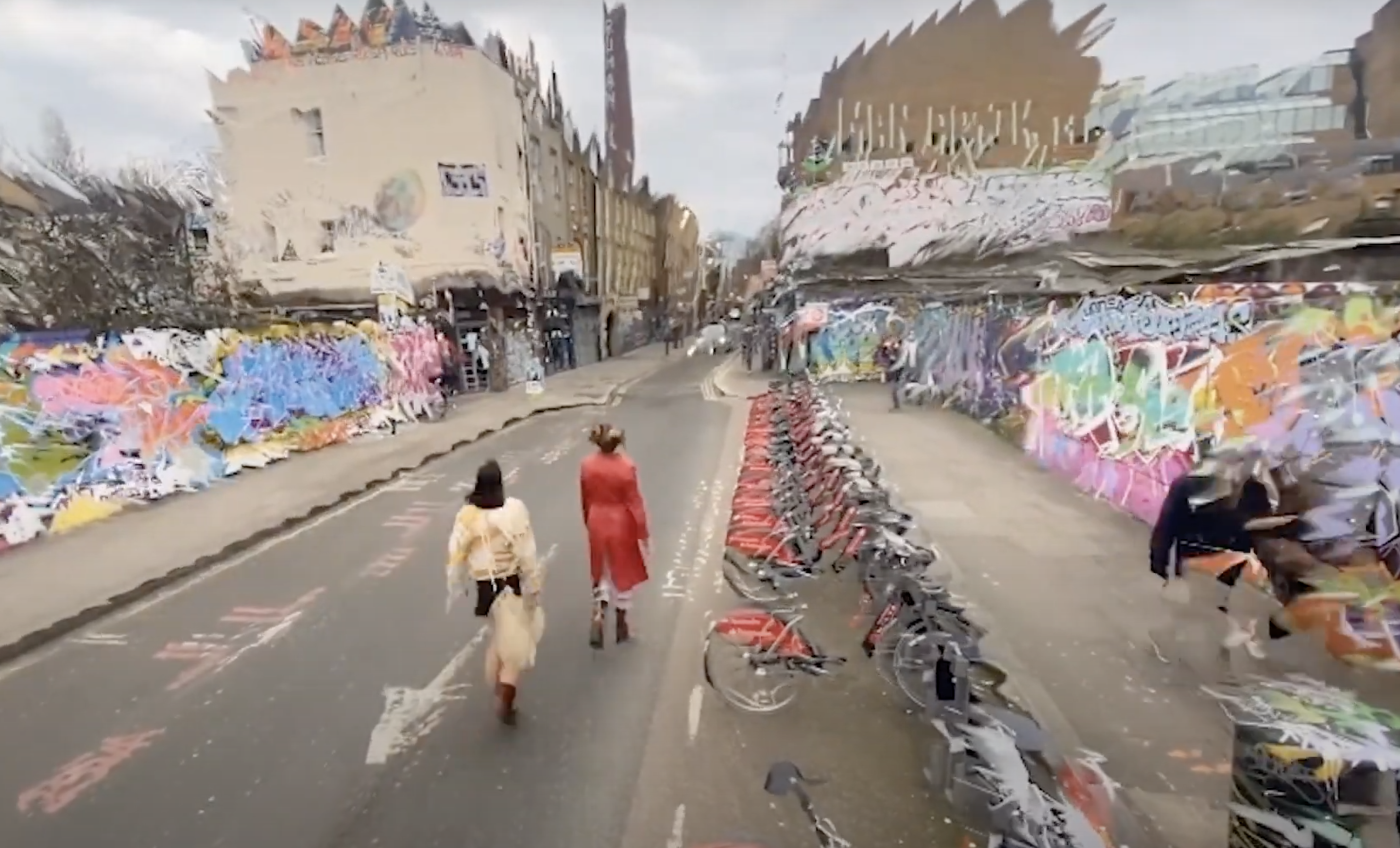 Distorted image of two girls walking on the street