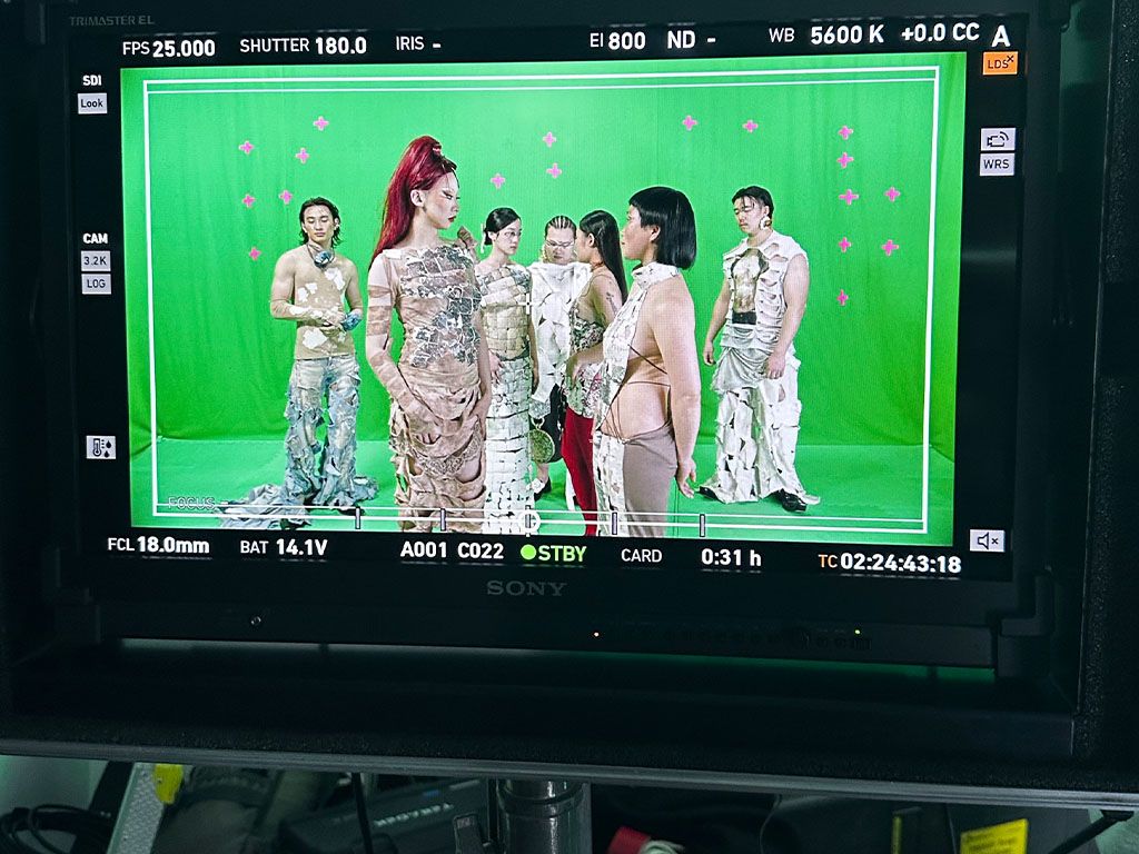 Creating a film with a green screen.