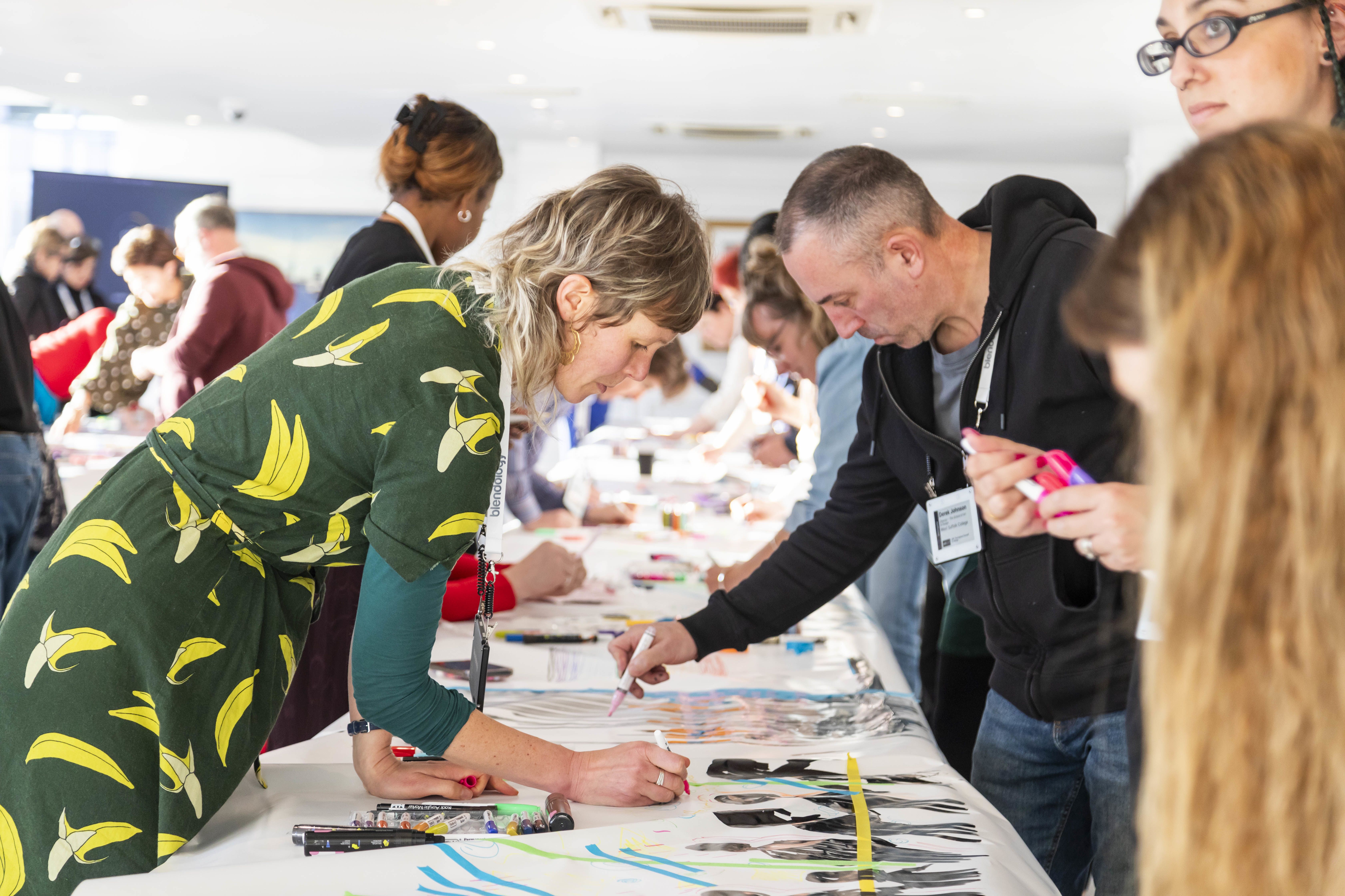 Delegates at the Teach Inspire Create Conference taking part in an artistic workshop