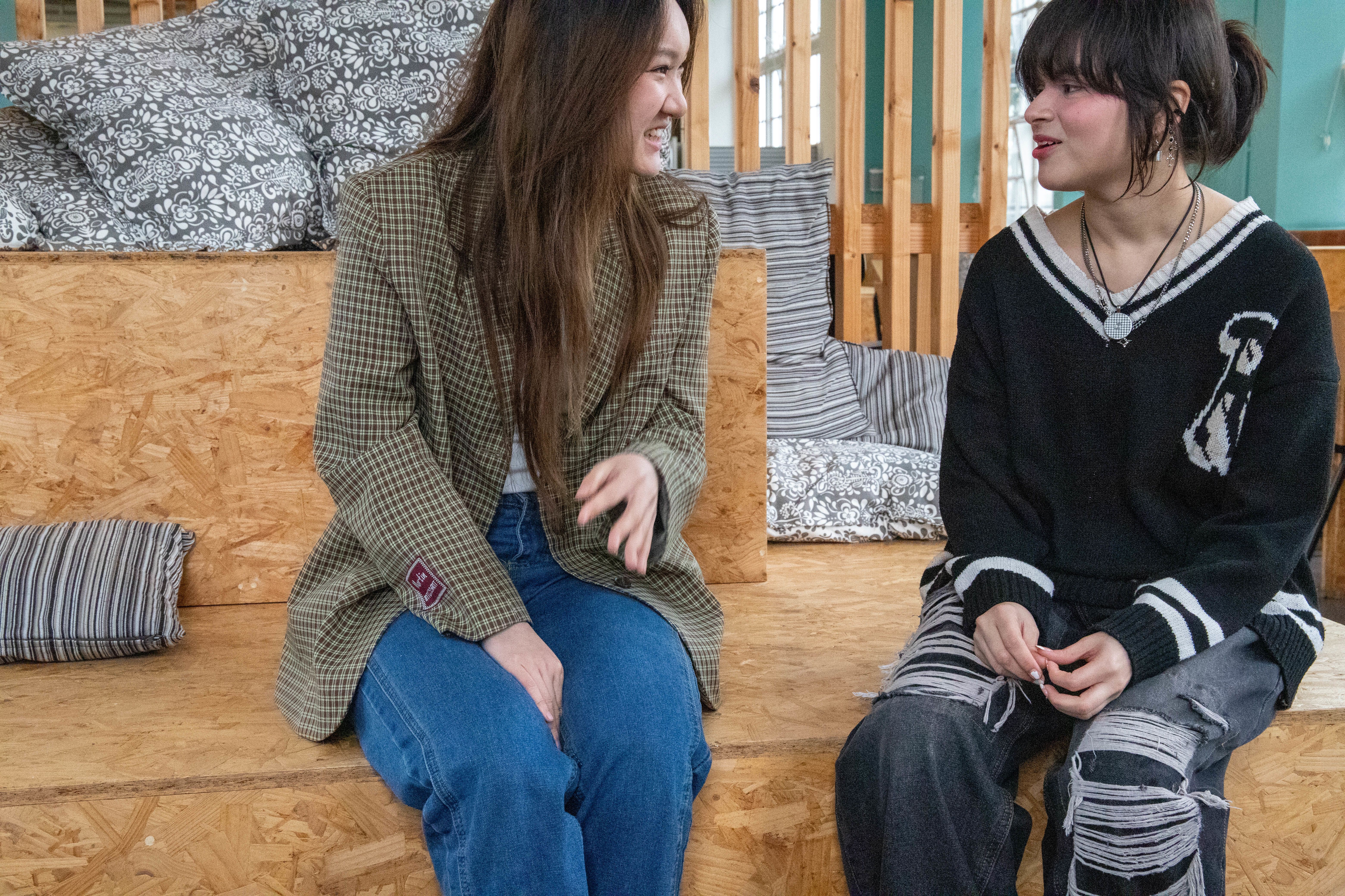 Students Yashvi and Sixu talking and laughing with each other in the Canteen at Lime Grove