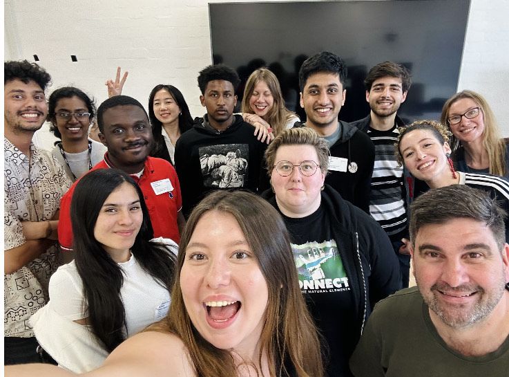 A group poses together for a selfie