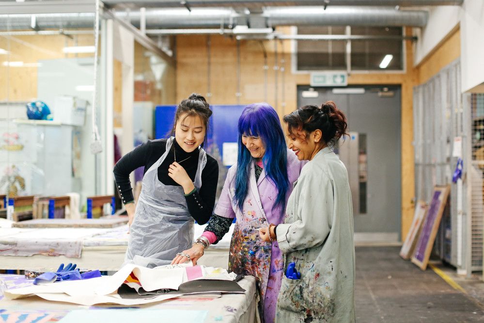Mei Zhang (Study Abroad Student), Natalie Gibson (Tutor) and Rita Kumari (Specialist Print and Dye Technician and Associate Lecturer) in the Print and Dye Workshop. Copyright holder: Alys Tomlinson.