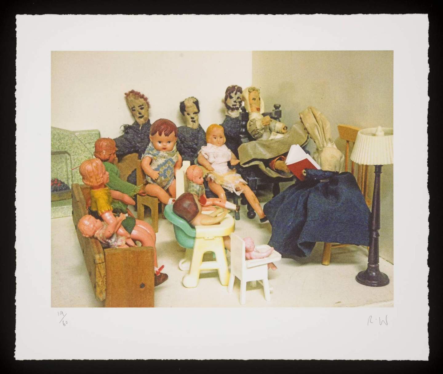 sculptural installation of objects depicting a family scene