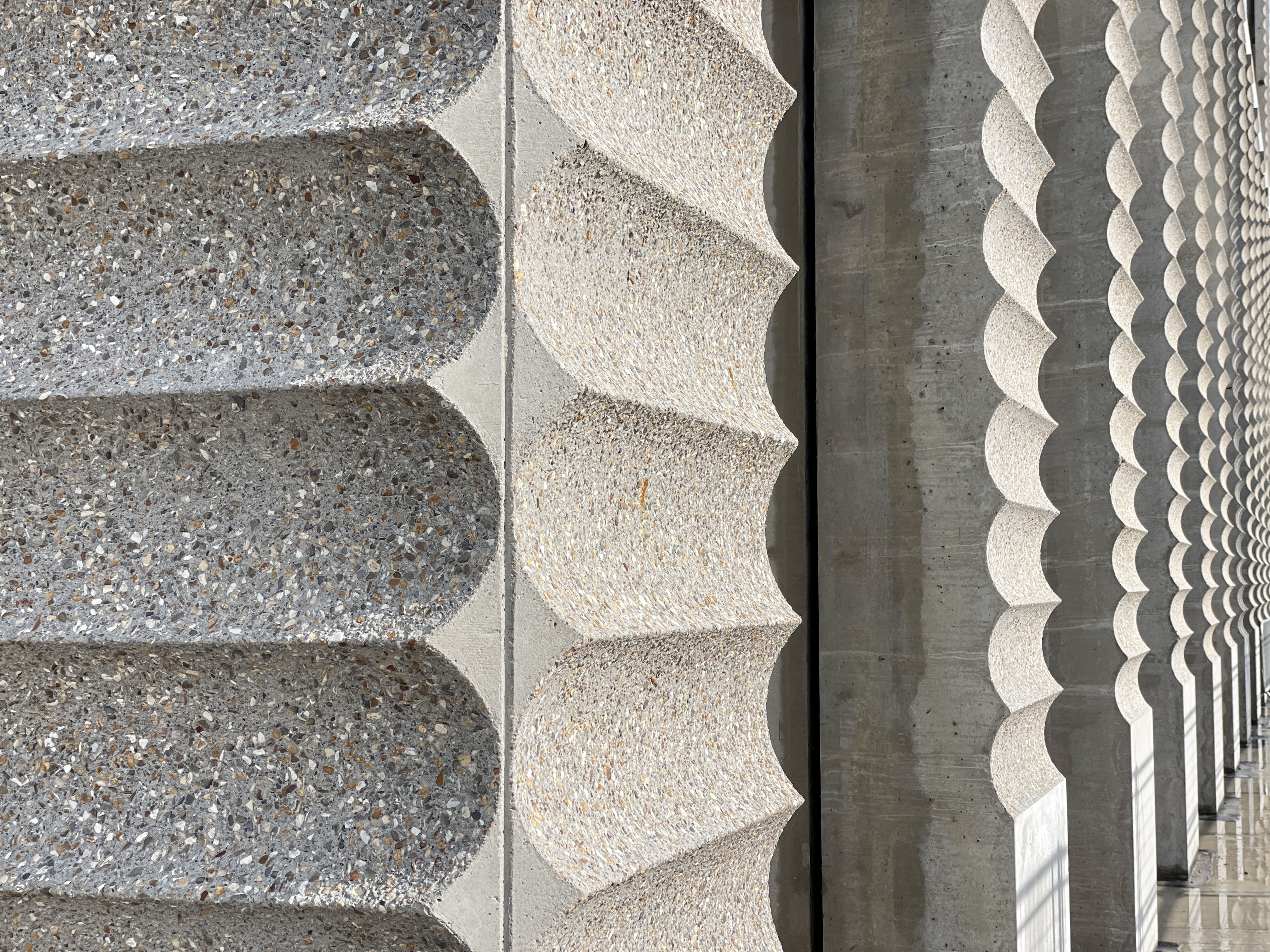 Close-up of scalloped cladding on LCF's new building. Photography by Allies and Morrison.