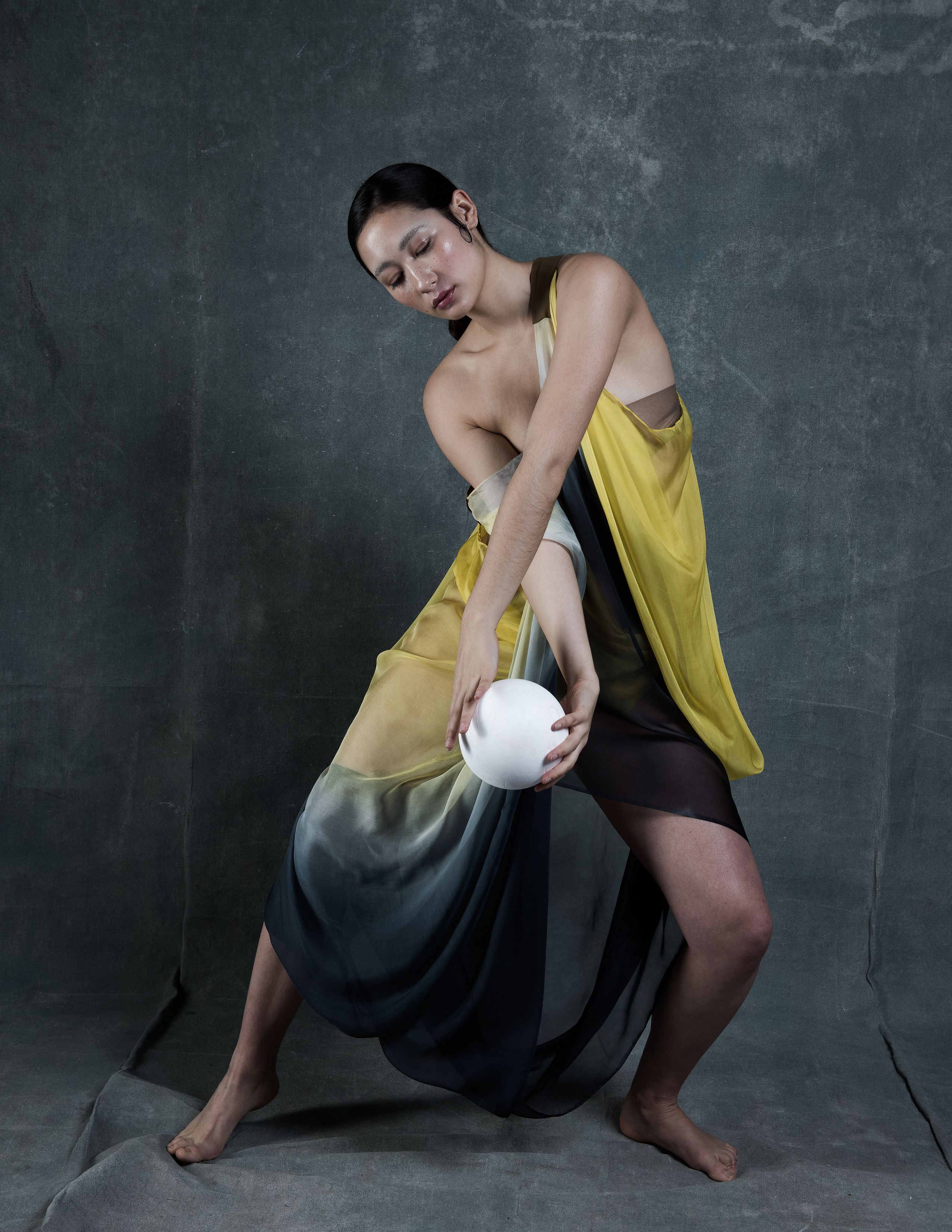 Model wearing yellow dress