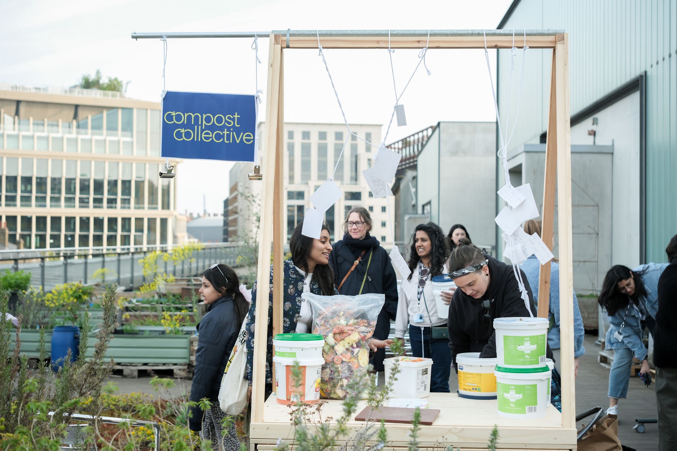 Members of Compost Collective on the roof garden at CSM