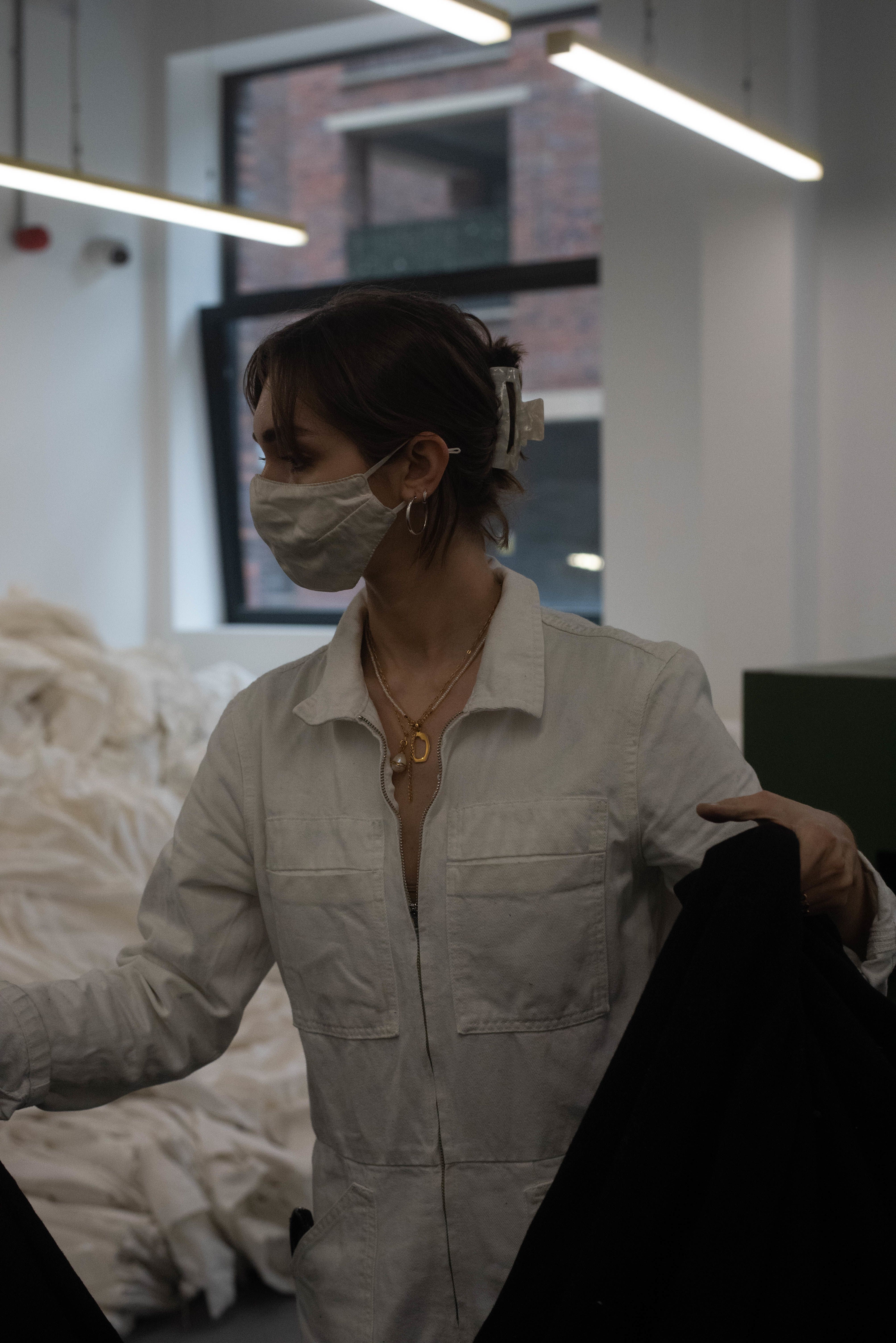 Photography of Kae Katz working in the lab