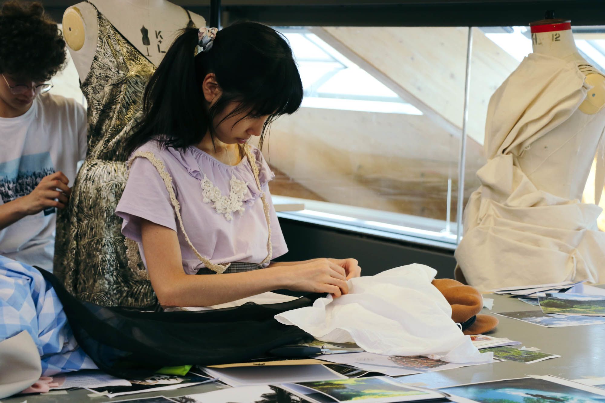 Student working with fabrics