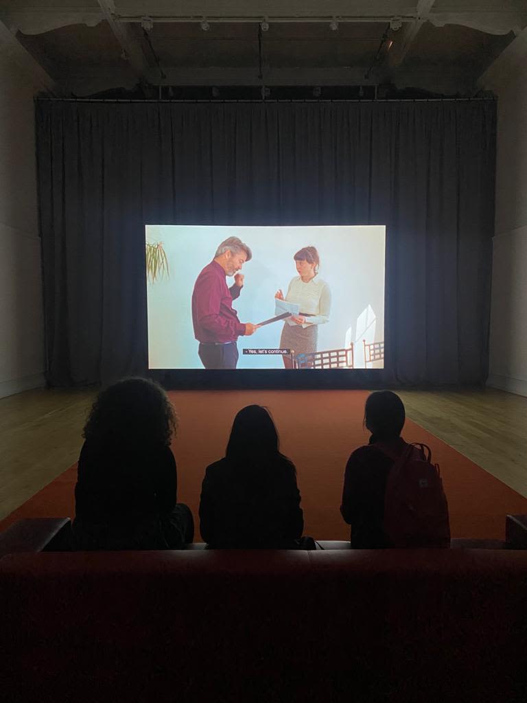 Students watching a film at South London Gallery